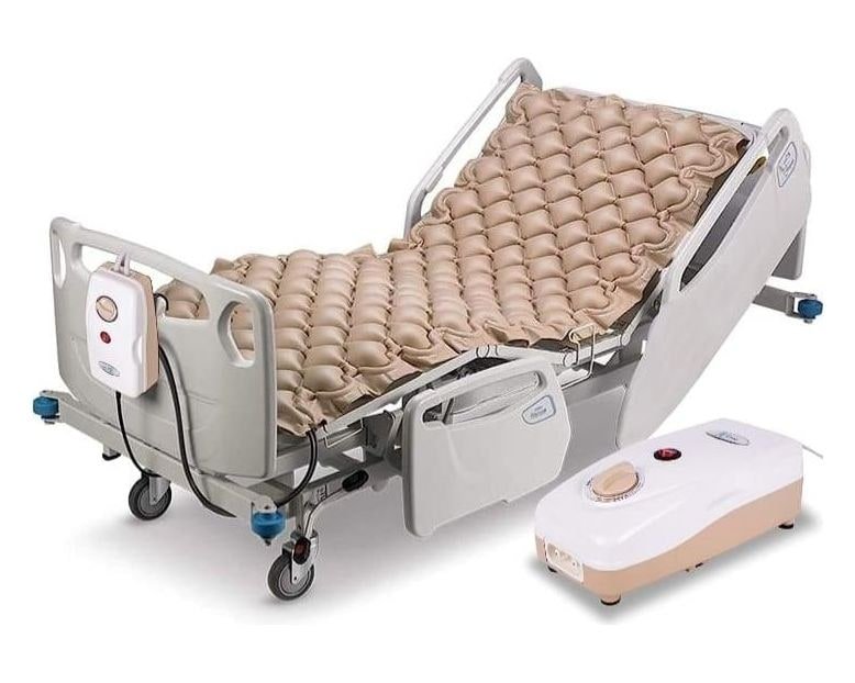 Bubble-cell air mattress on a hospital bed with an electric pump